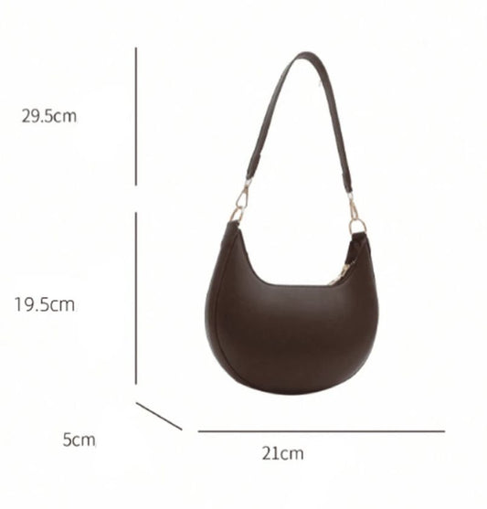 Sac à bandoulière de style français, chic et texturé, idéal au quotidien.